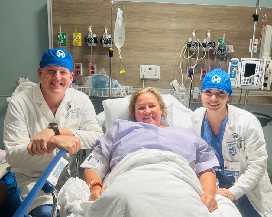 Dr. Robert Wenham (left) and Dr. Monica Avila, with their patient